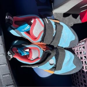 Women’s basically new climbing shoes sz 9 and size small harness